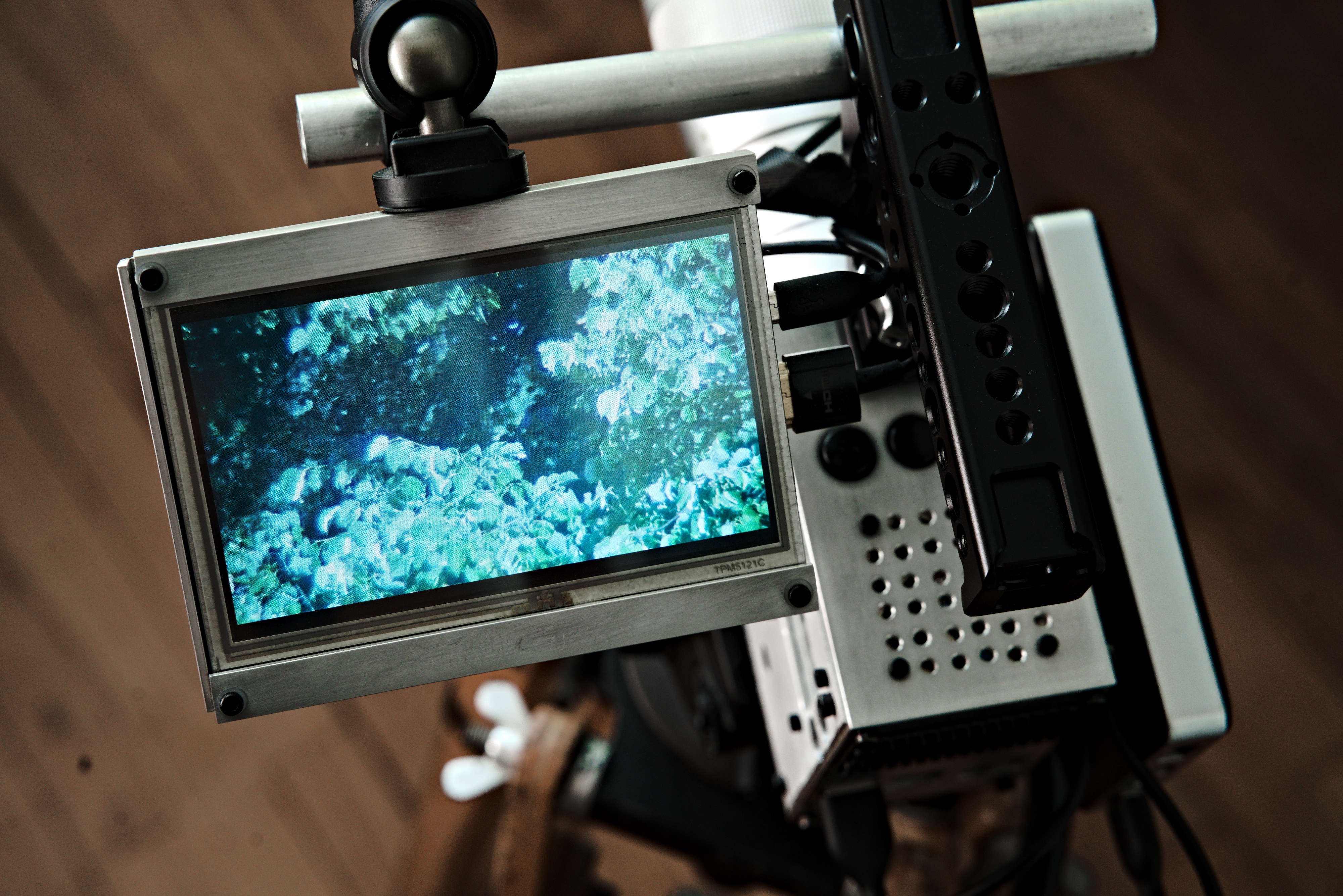 camera topview with screen showing trees