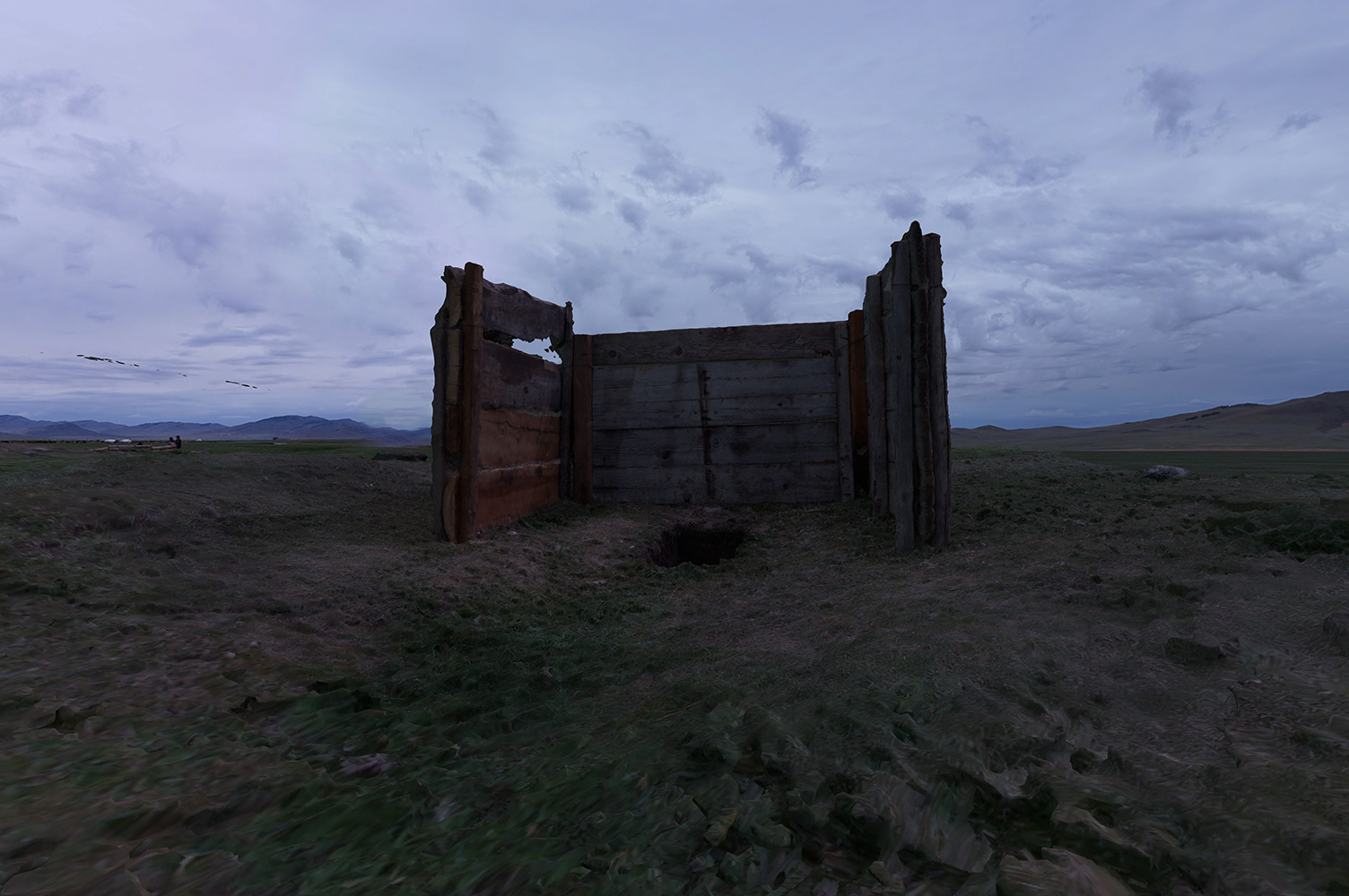 3D scan of outdoor toilet consisting of hole inthe ground and small wooden fence